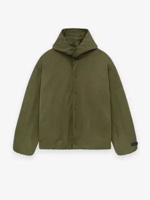 Fear of God Essentials Textured Nylon Hooded Coaches Jacket in Military