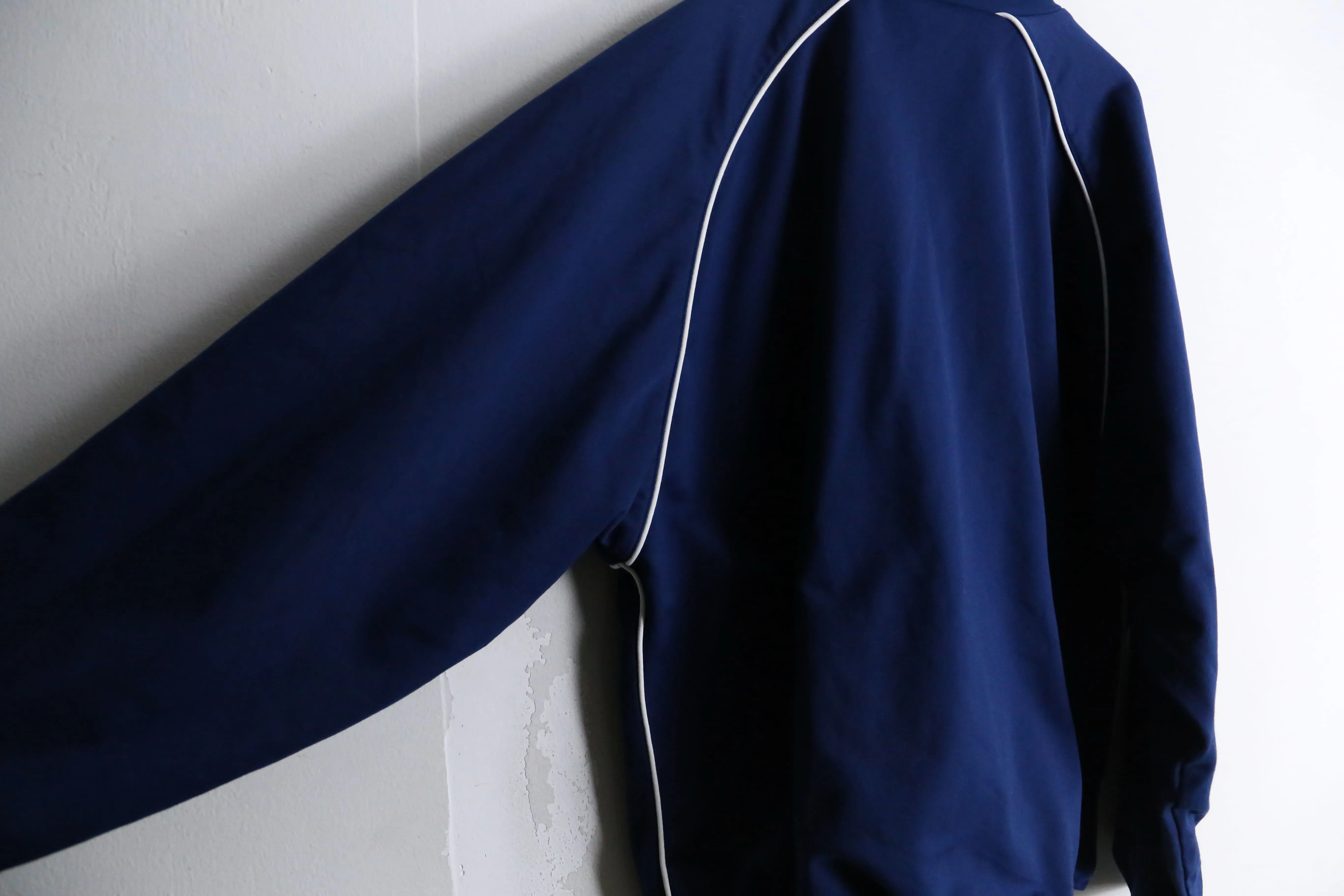 "DIADORA" blue × black reversible track jacket