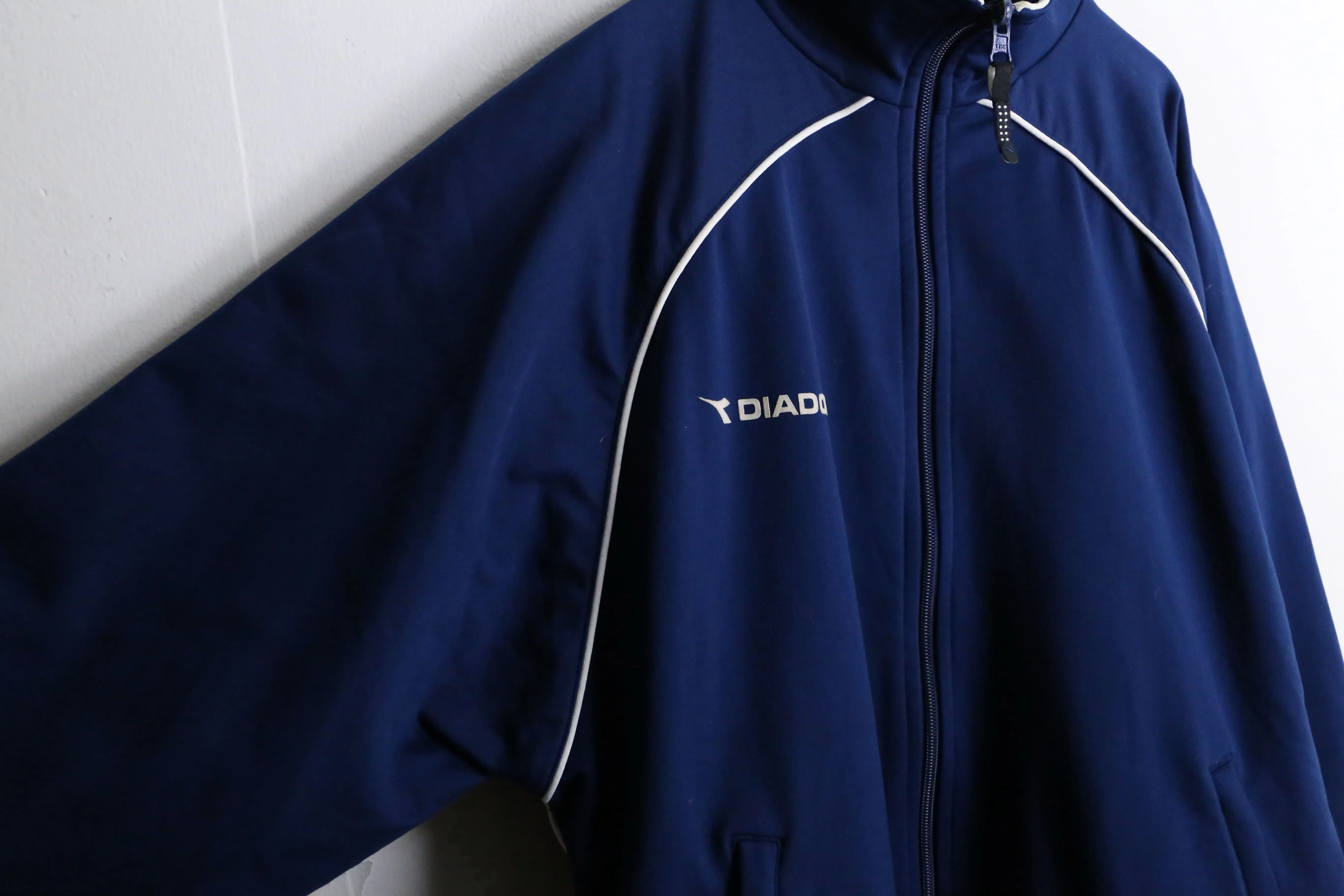 "DIADORA" blue × black reversible track jacket