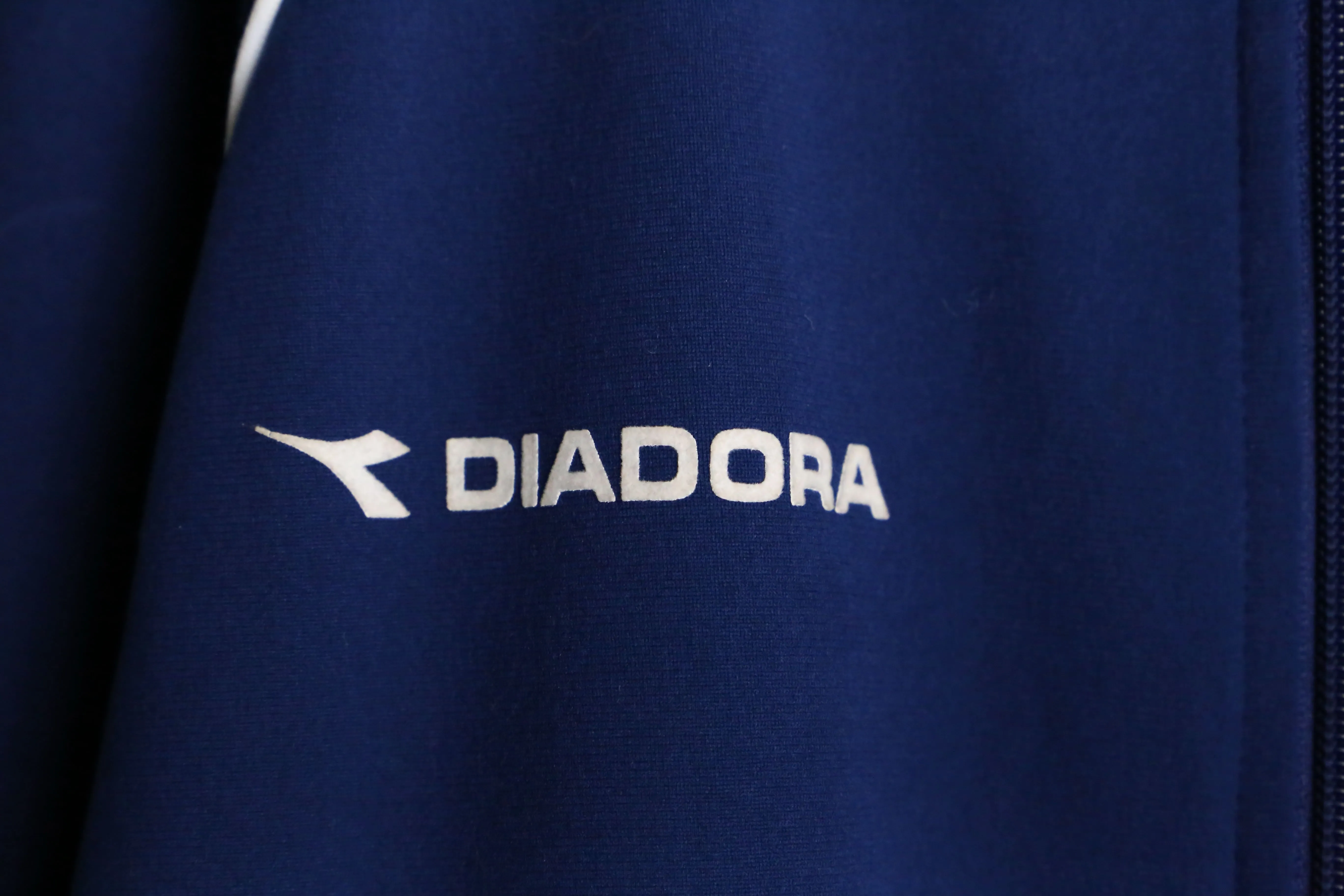 "DIADORA" blue × black reversible track jacket